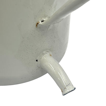 Close-up of a white enamel planter with a  spout on a white background