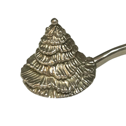 close up of a decorative Christmas tree shaped silver candle snuffer on a white background