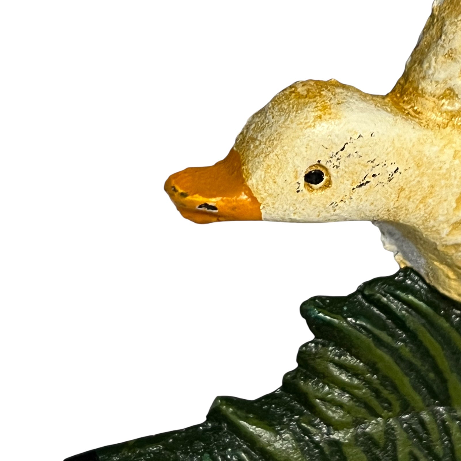 Close up of French farmhouse style goose cast iron toilet roll holder on a white background