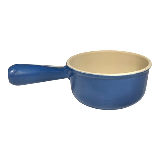 Blue cast iron saucepan with beige interior on a white background