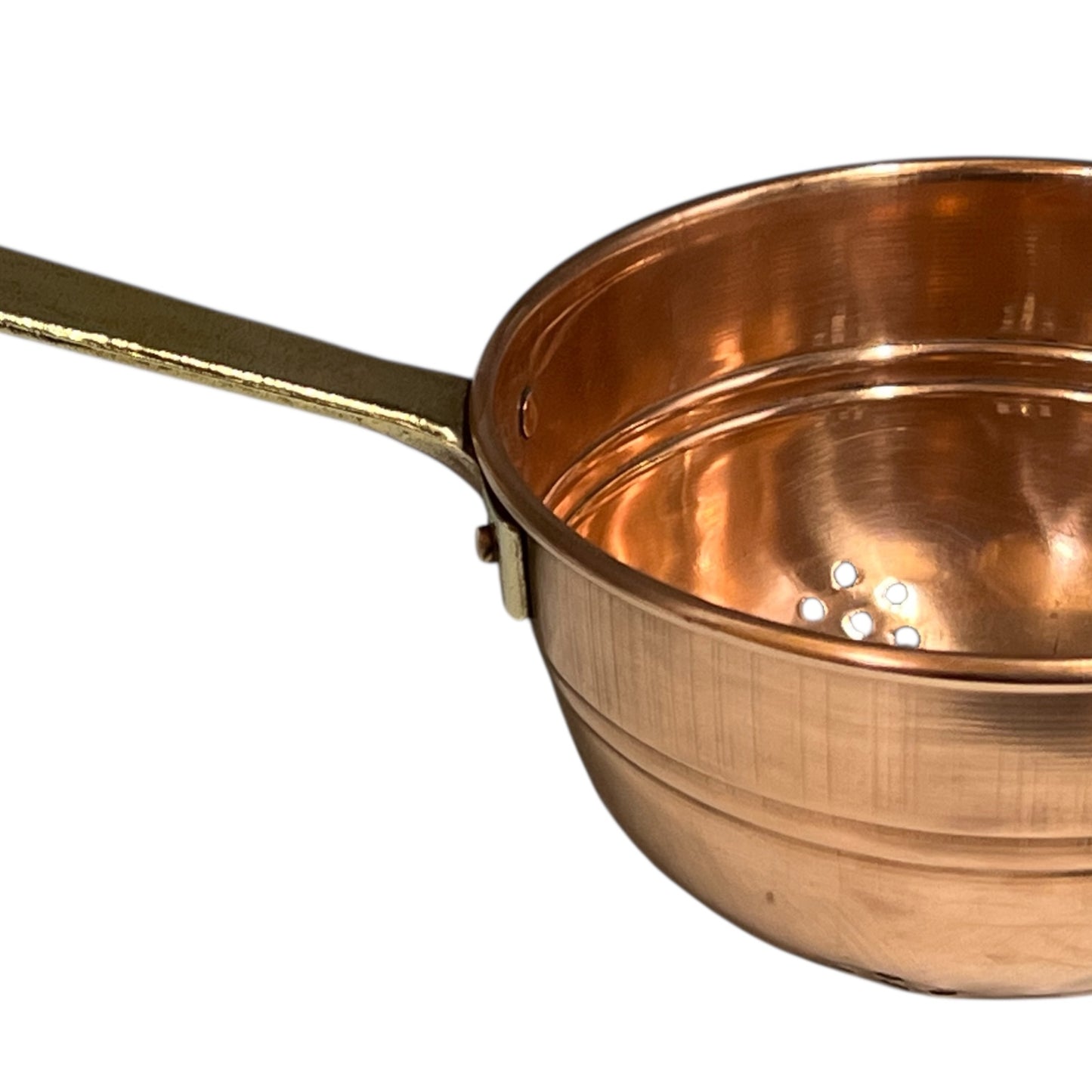 Small copper French sieve with a brass handle on a white background