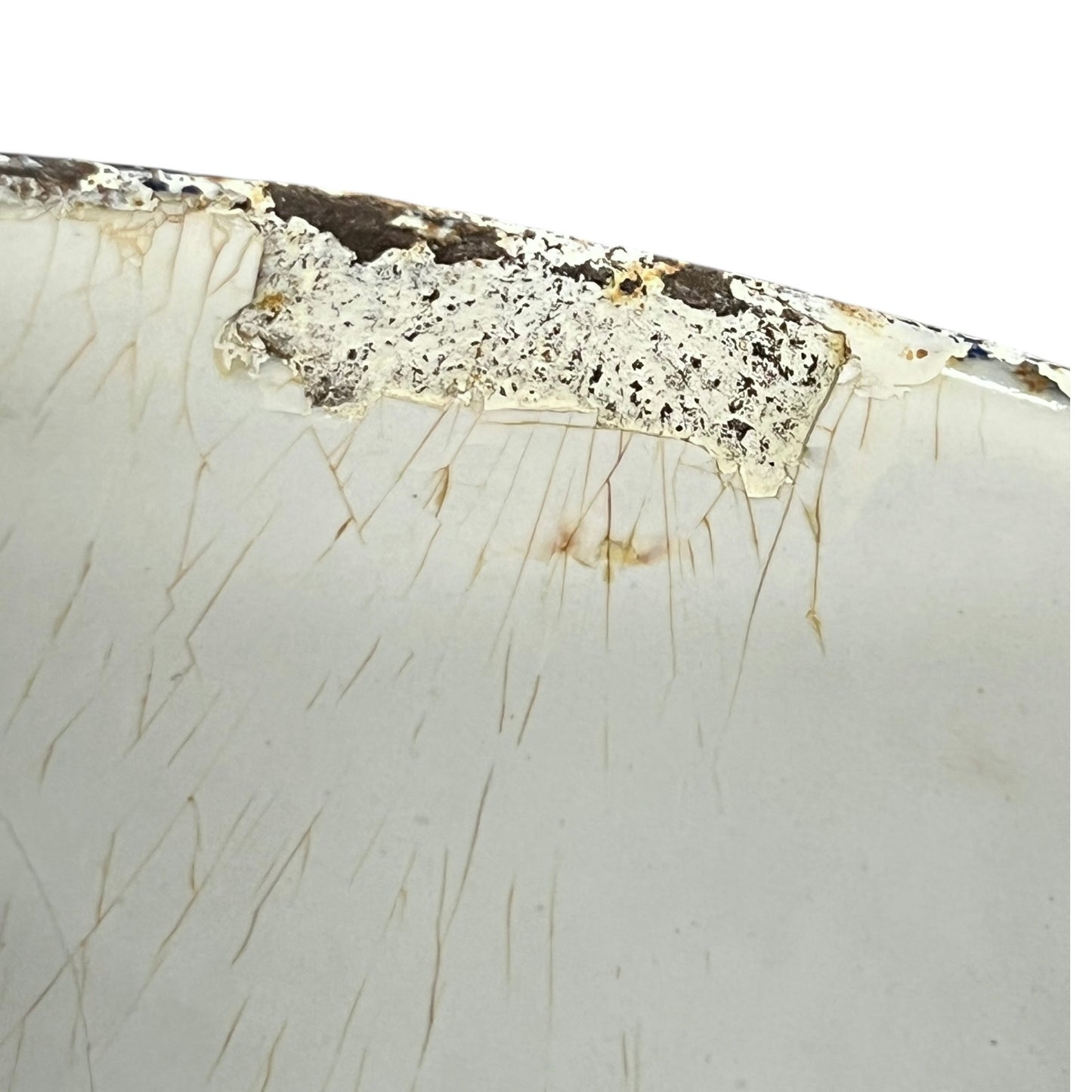 close up image of vintage planter rim
