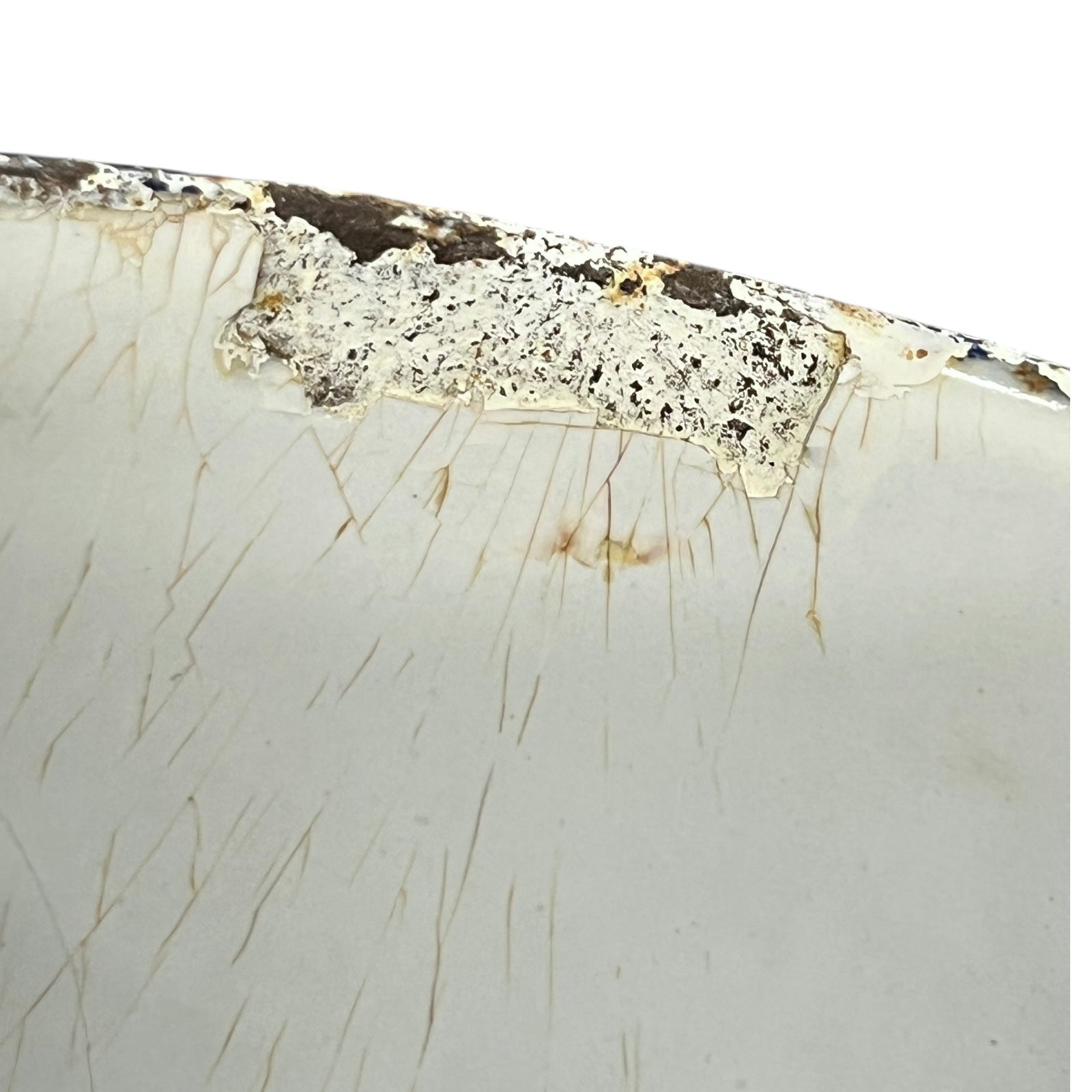 close up image of vintage planter rim