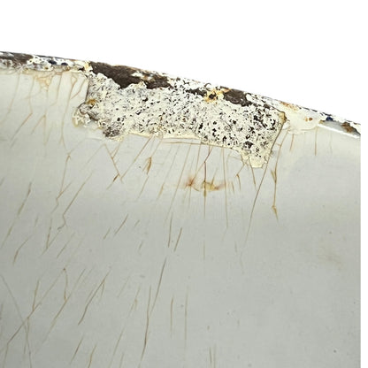 close up image of vintage planter rim