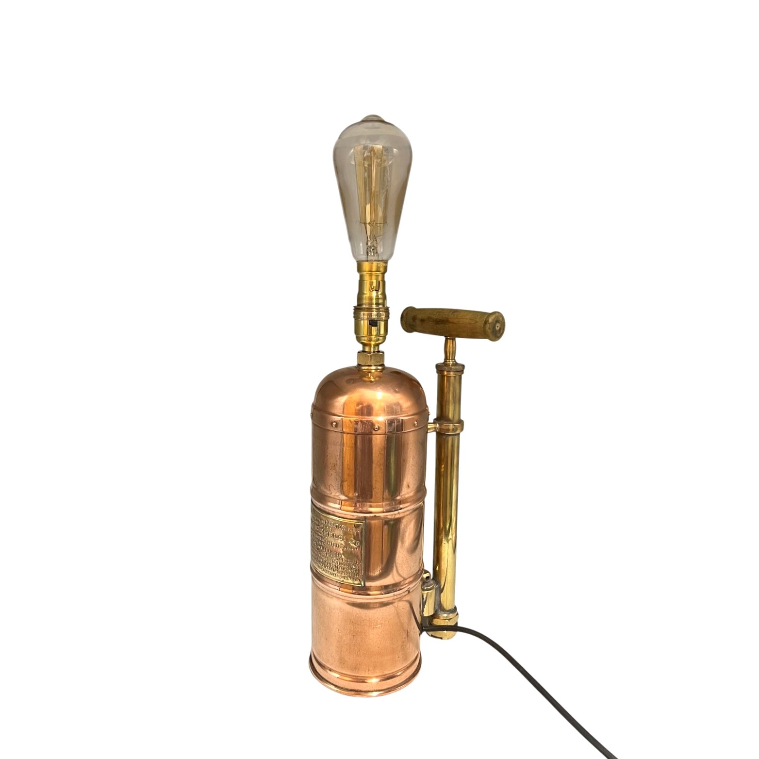 Copper and brass lamp with vintage design on a white background