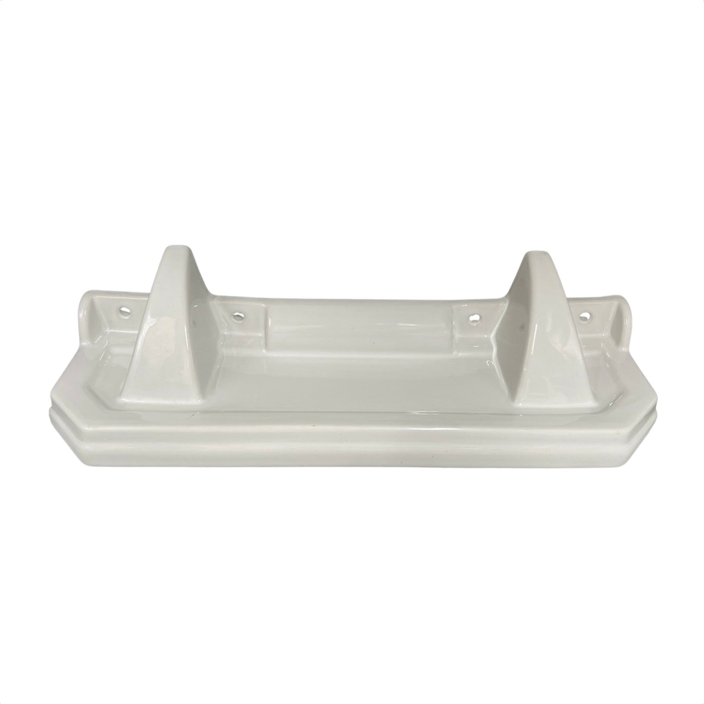 White ceramic shelf with three raised sections on a white background