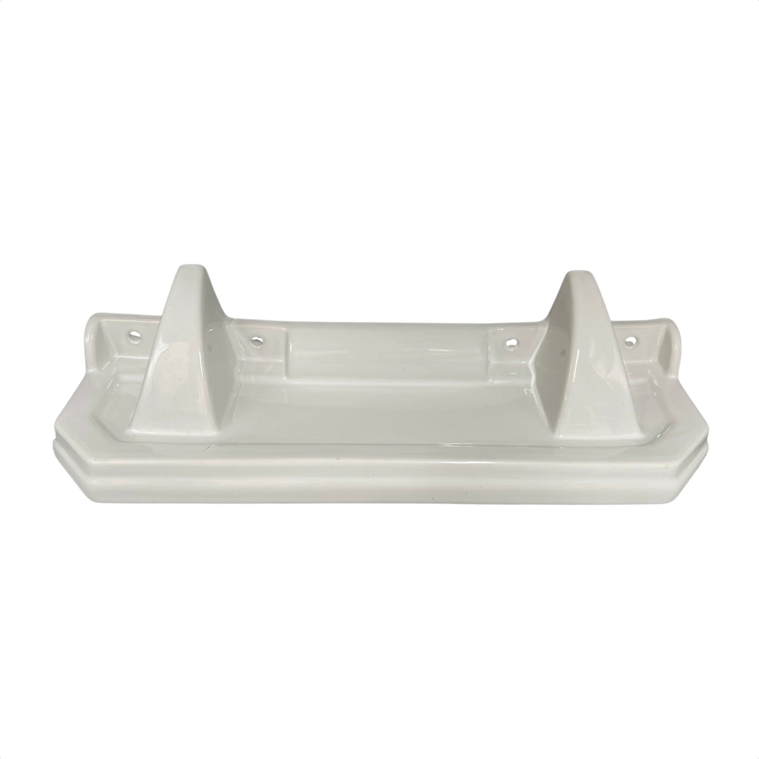 White ceramic shelf with three raised sections on a white background