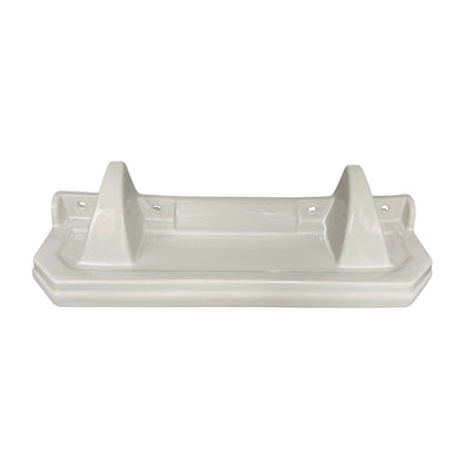 White ceramic shelf with three raised sections on a white background