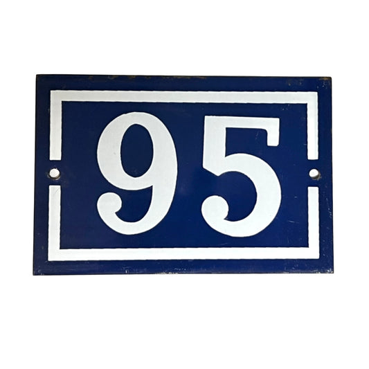 A rectangular blue house number plaque 95 with white lettering and border, shown on a plain white background.