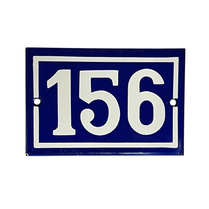 A rectangular blue house number 1plaque with white lettering and border, shown on a plain white background.6 