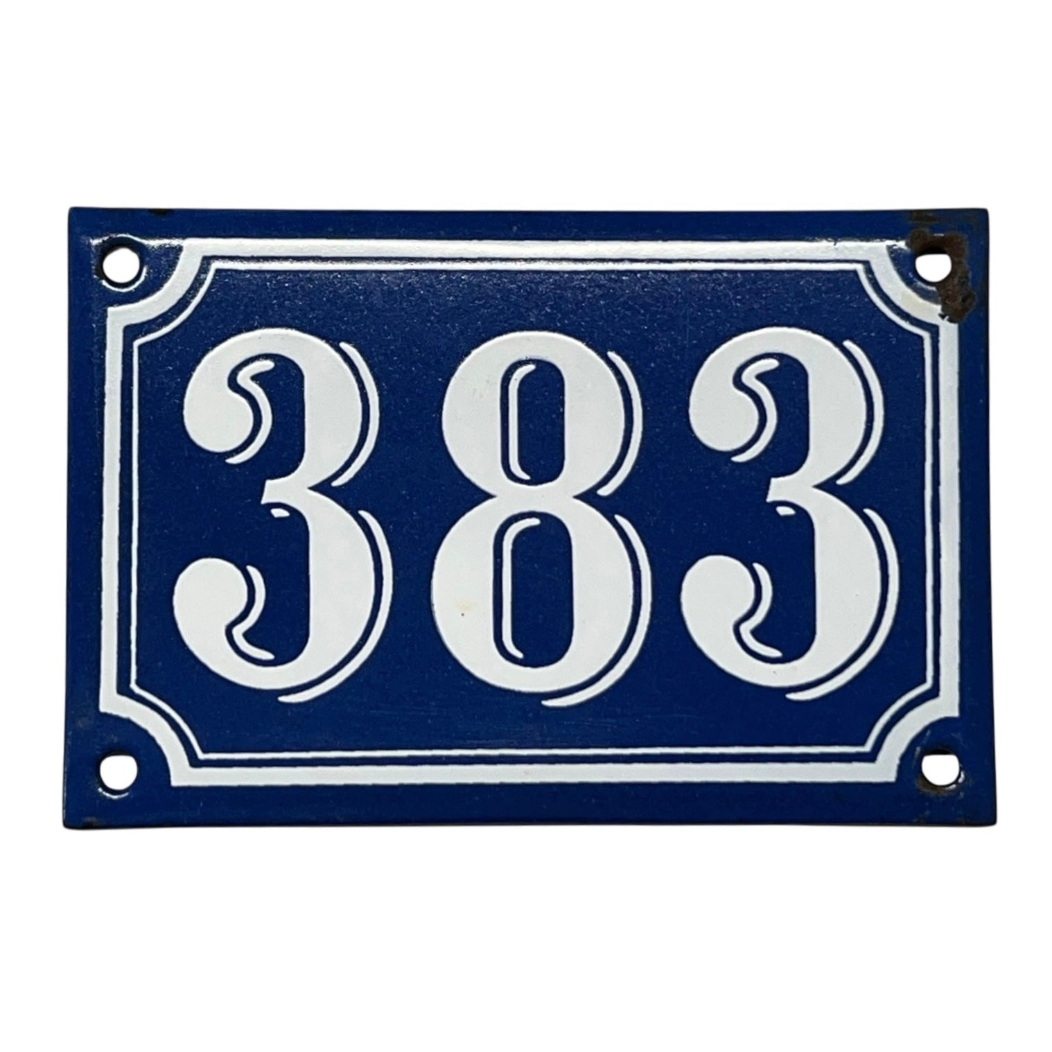 Navy blue rectangular plate with white numbers '383' on a white background
