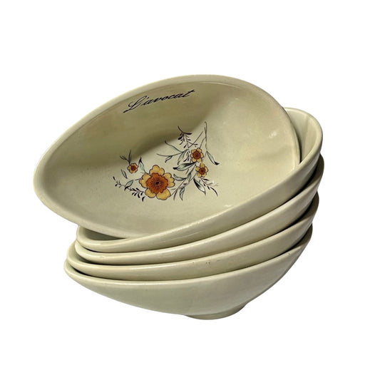 Set of four ceramic bowls with floral design and 'Lavocat' branding on a white background