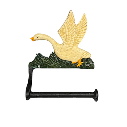 A decorative toilet roll holder shaped like a flying goose perched on a dark green base, with a black horizontal bar. The goose is cream-colored with a yellow beak and feet, set against a plain white background.