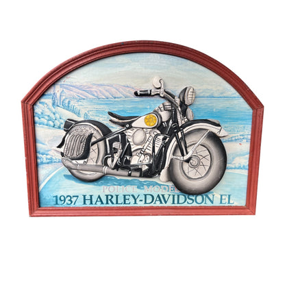 A framed decorative sign featuring a 1937 Harley-Davidson motorcycle illustration over a blue scenic background, with a reddish-brown wooden frame and the text 'POLICE MOBILE 1937 HARLEY-DAVIDSON EL' at the bottom.