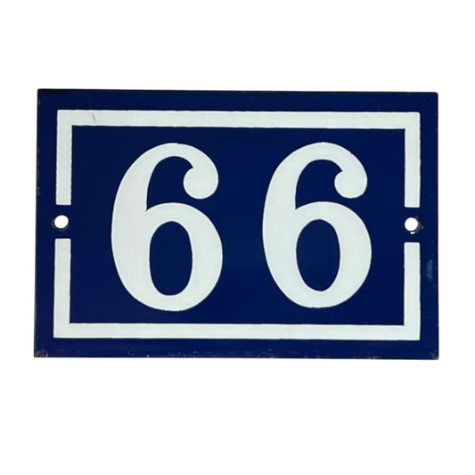 A rectangular blue house number plaque with white border and white numerals '66', shown on a plain white background.