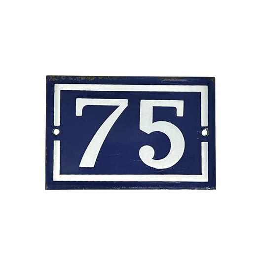 French vintage door number 75, blue with white numbers set on a white background 