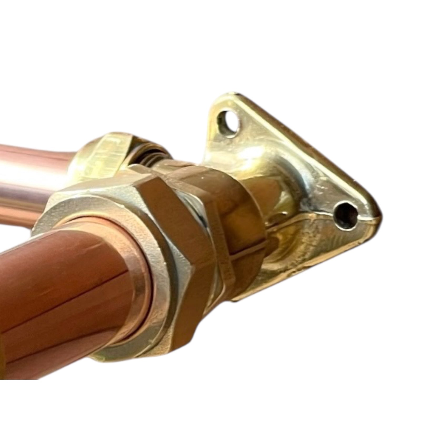 Brass and copper kitchen or bathroom wall taps on a white background