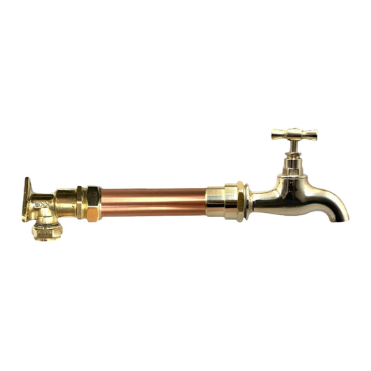Brass and copper kitchen or bathroom wall taps on a white background