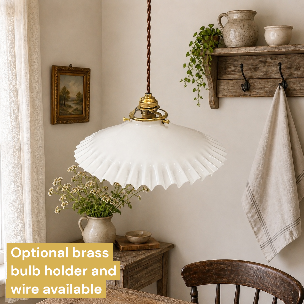 Vintage-style pendant light with white shade and brass bulb holder in a home setting.