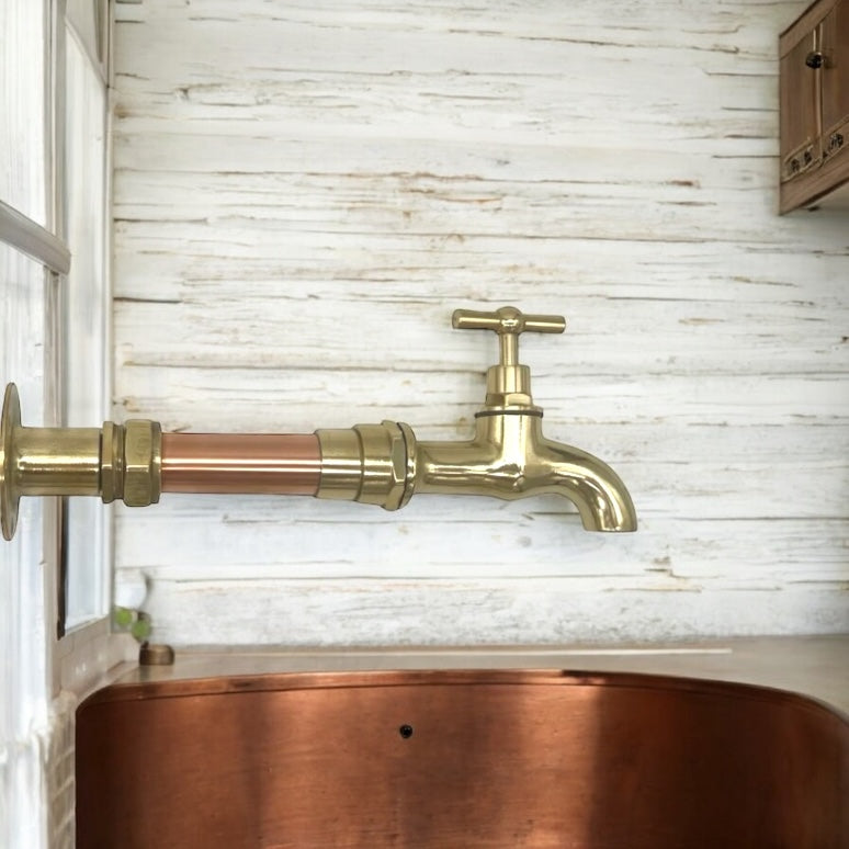 copper and brass wall mounted tap 