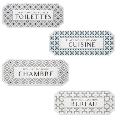 Set of decorative wall plaques with French text and geometric patterns on a white background