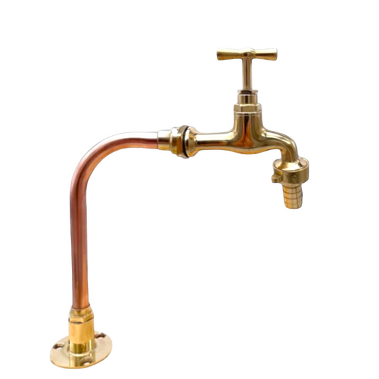Gold and copper faucet on a white background
