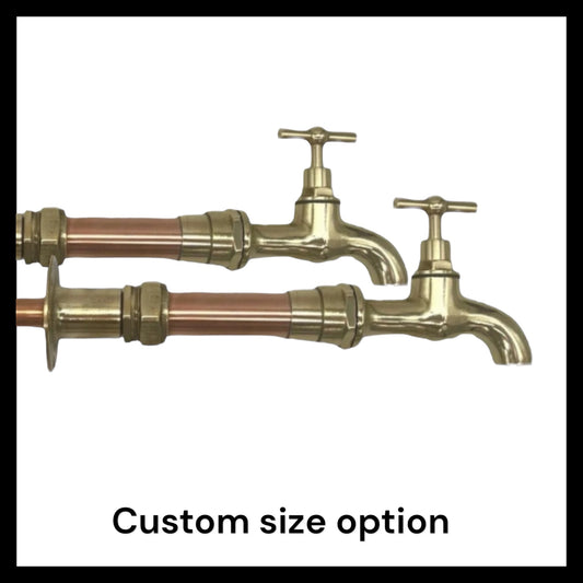 Pair of handmade copper and brass wall mounted made to measure taps