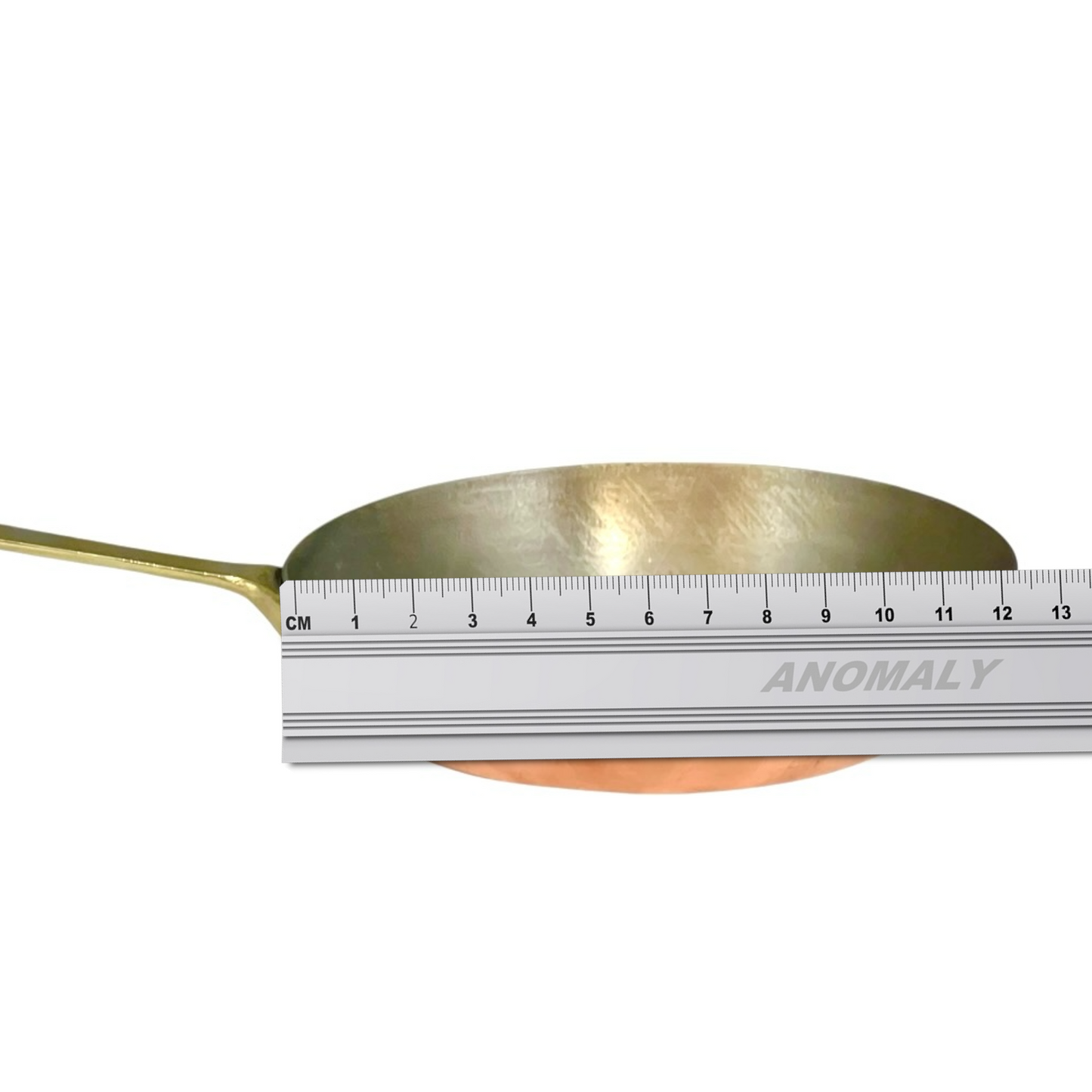 Copper frying pan with a ruler showing measurements on a white background 