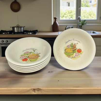 6 cous cous plats with decorated patterns on a kitchen table 