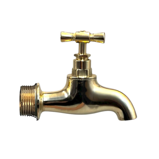 Gold faucet on a white background