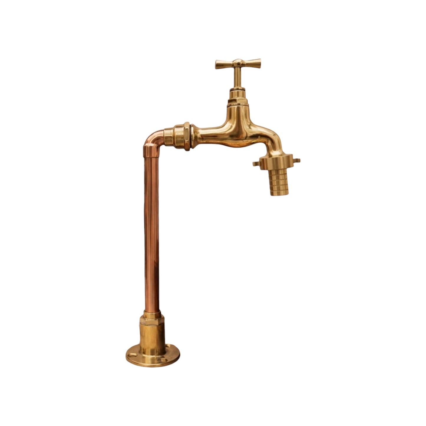 Brass and copper faucet on a white background