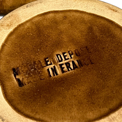 makers stamp on the base of a vintage French escargot plate 
