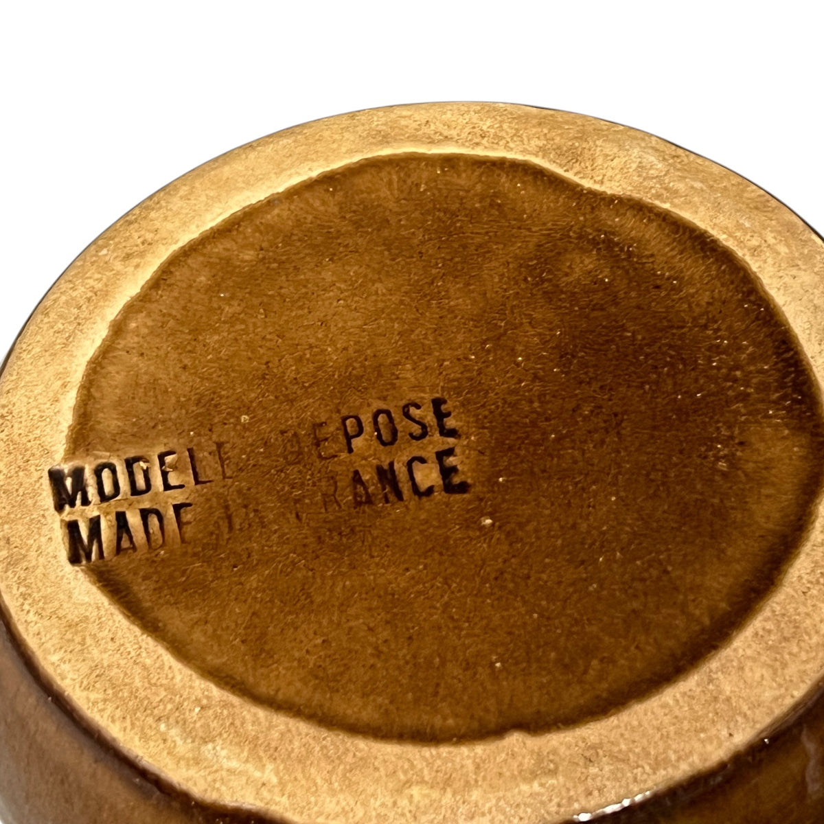 makers stamp on the base of a vintage French snail plate 