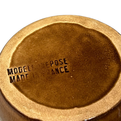 makers stamp on the base of a vintage French snail plate 