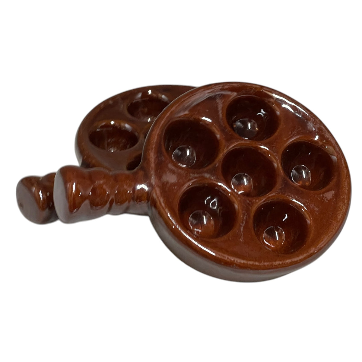 Pair of French chocolate brown snail serving plates each with 6 indents, ideal for a French restaurant or country farmhouse kitchen table - top view 