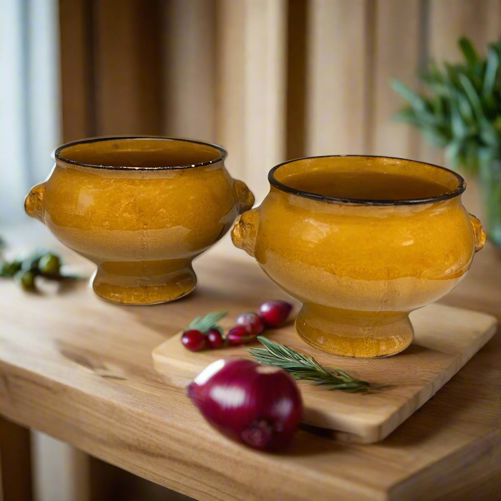 Pair of amber and brown coloured glazed ceramic French Lions Head Handle Bowls for sale by All Things French Store
