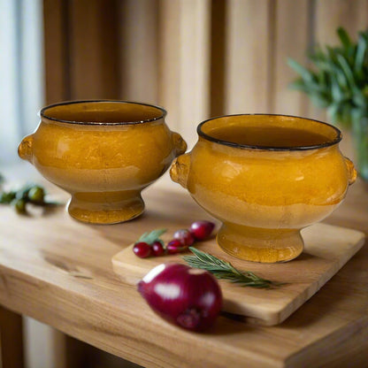 Pair of amber and brown coloured glazed ceramic French Lions Head Handle Bowls for sale by All Things French Store