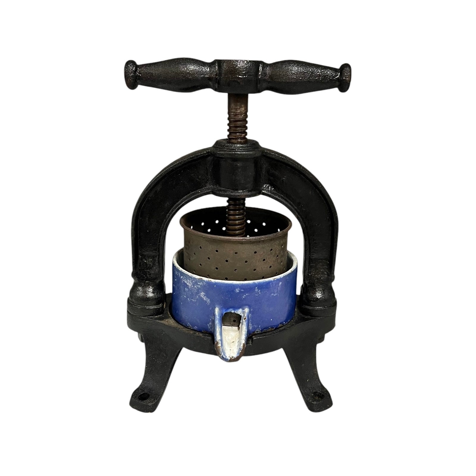 Vintage French cast iron metal press with a blue container on a white background