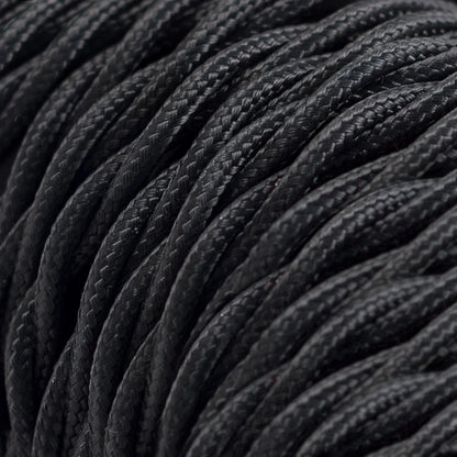 Close-up of black textured fabric with a focus on texture and color.