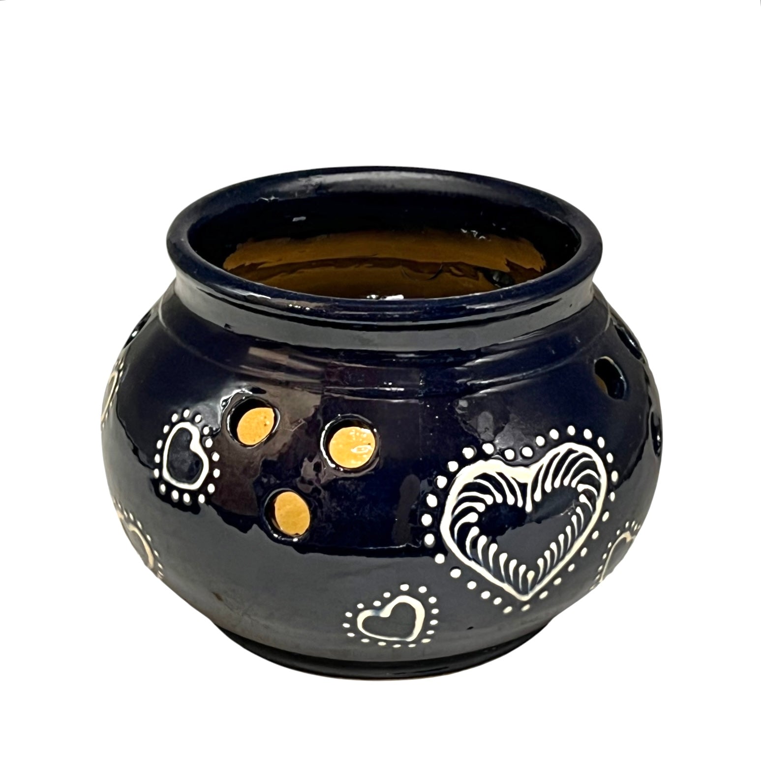 Blue ceramic pot with heart designs on a white background