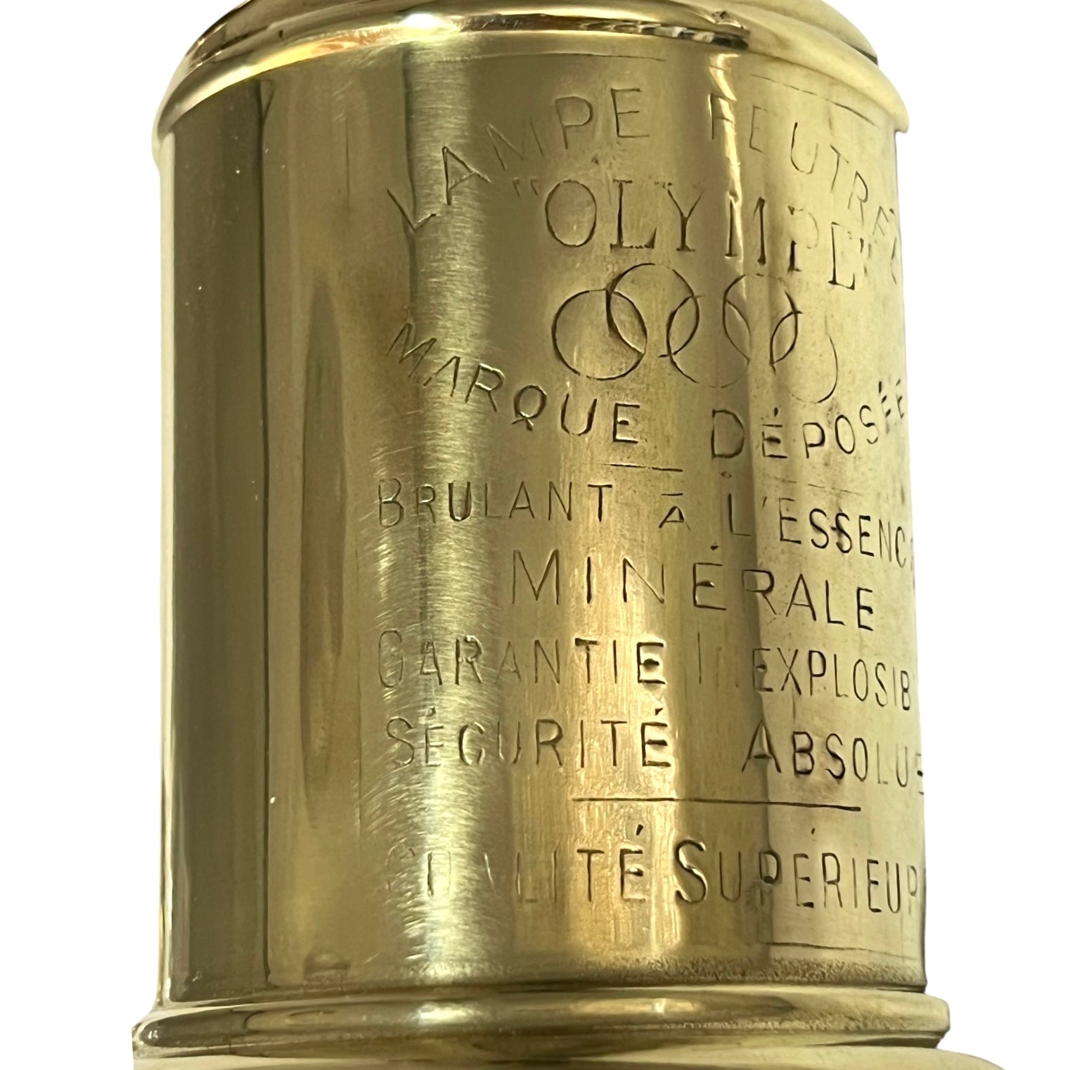 French oil lamp with engraved text on a white background
