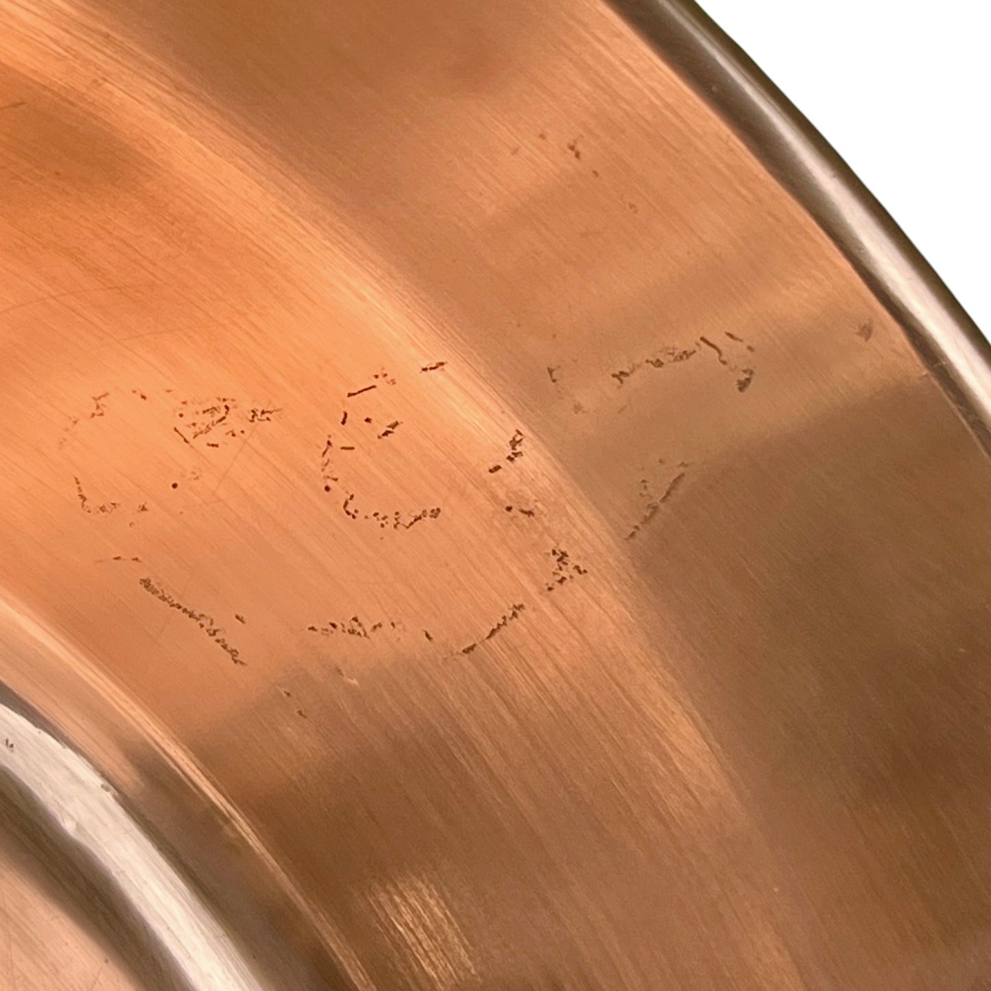 Close-up of a copper basin on a white background 