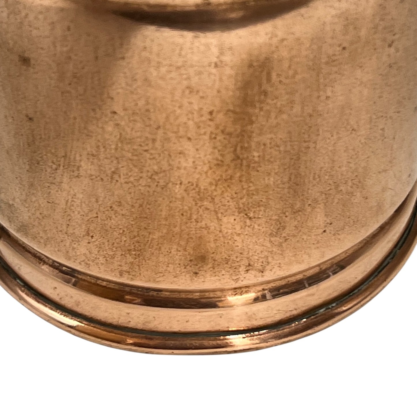 Close-up of a copper lamp on a white background