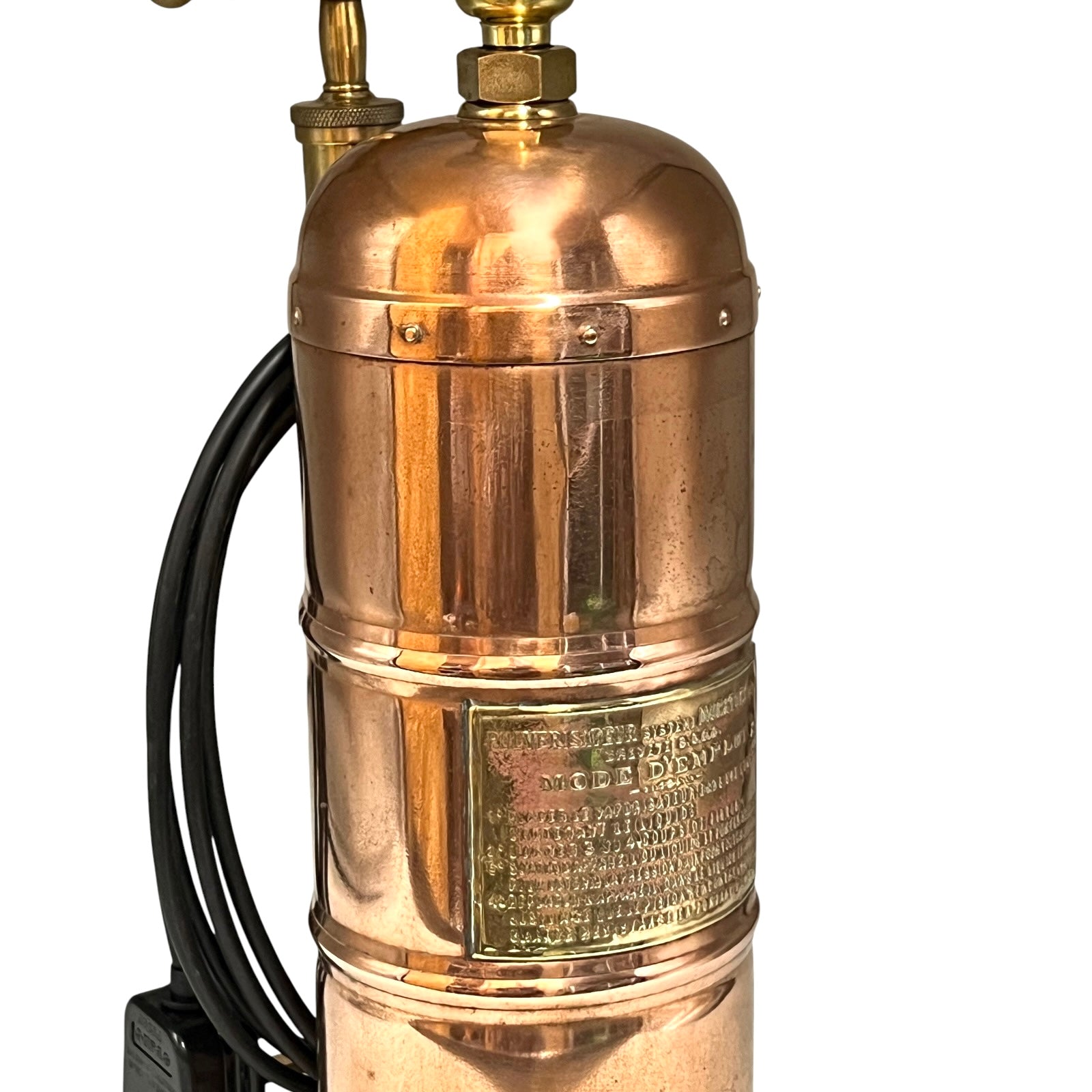 Copper lamp with visible branding on a white background