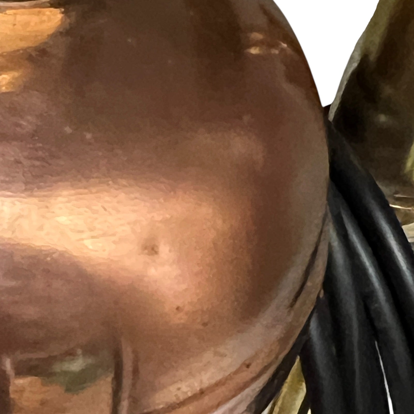 Close-up of a copper lamp to view