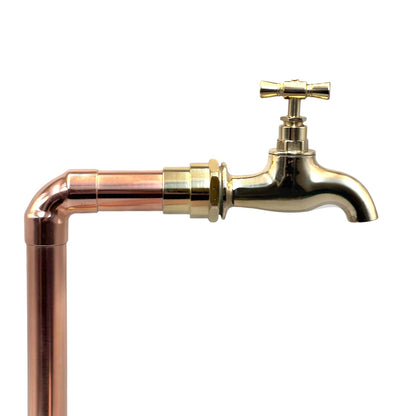 brass tap head with tall copper pipe fittings on a white background 