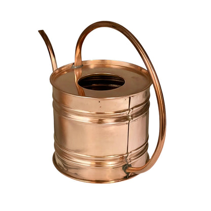 A traditional copper  watering can with a curved handle, a long spout, and a circular opening at the top, shown on a plain white background.