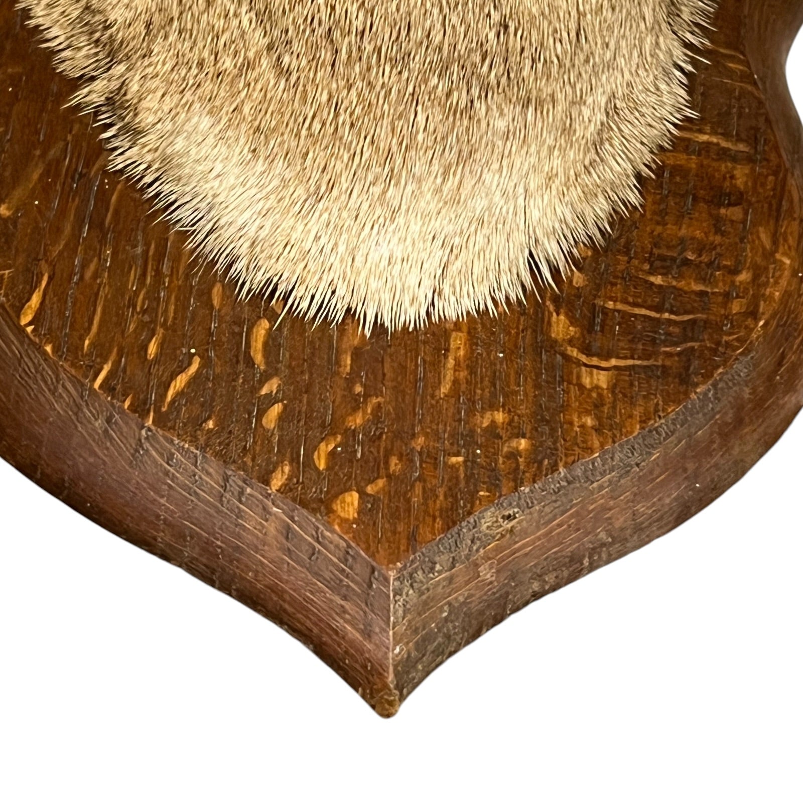 Close-up of a wooden corner with a textured finish