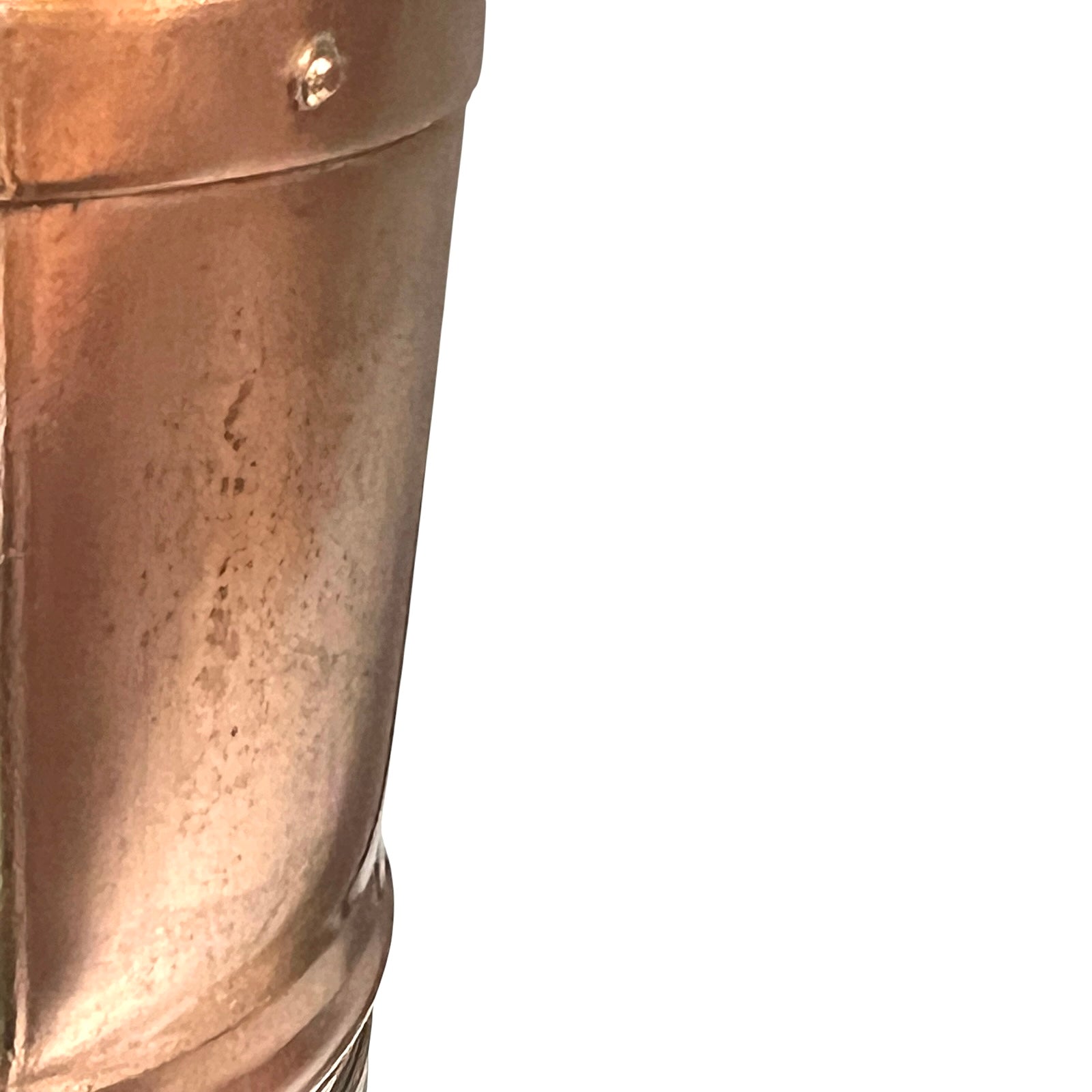 Close-up of a copper lamp with a white background