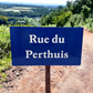French blue and white Rue du Perthuis road sign 
